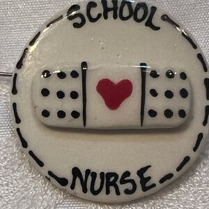Vintage Ceramic School Nurse pin